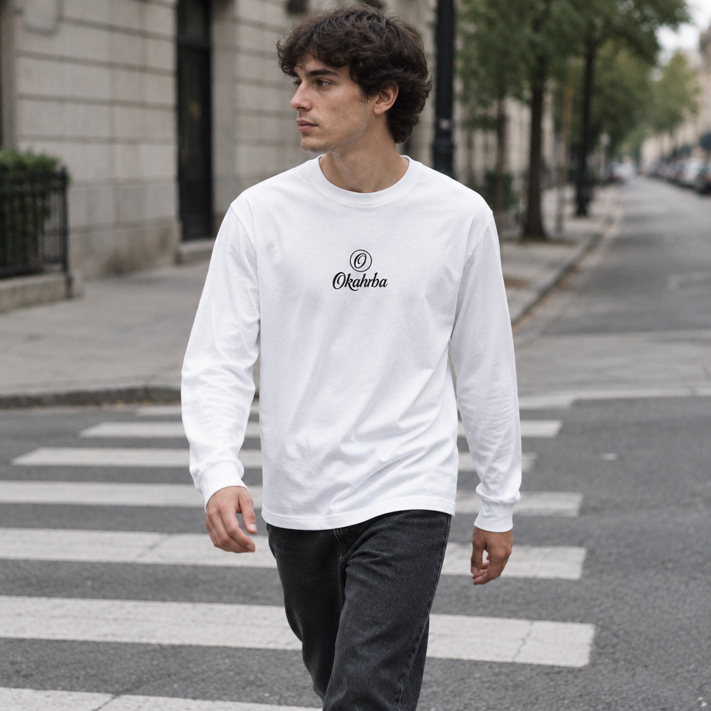 Okahrba Premium Long Sleeve Tee in white, worn on a city street