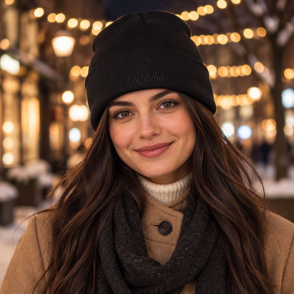 Okahrba Signature Beanie in black, worn on a winter evening